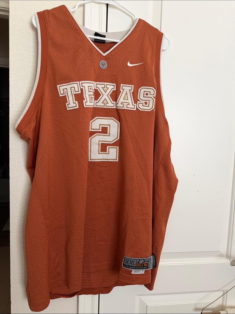 Nike Men's Texas Basketball Jersey in Burnt Orange with White Trim